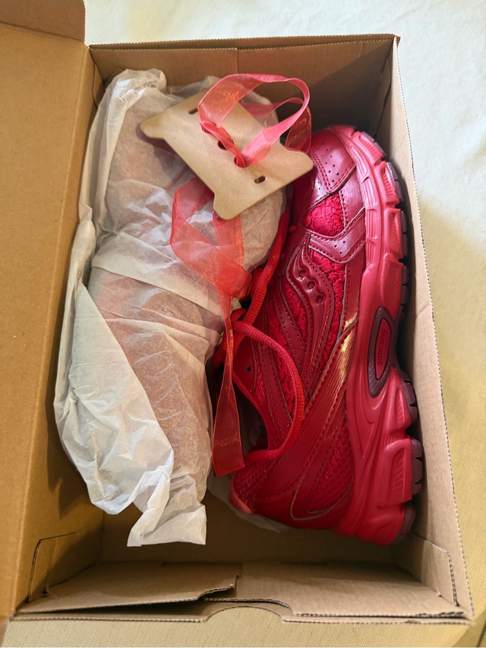 Red Saucony ride millennium